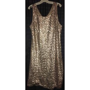 Gold body hugging sparkly cocktail dress